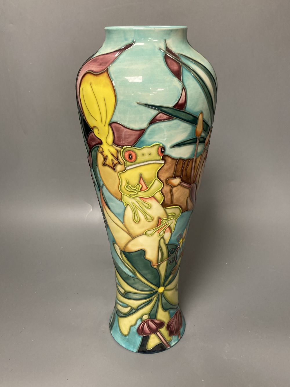 A Moorcroft vase, Jaraqui pattern, designed by Jeanne McDougall, limited edition number 18 of 250, height 37cm, together with origi